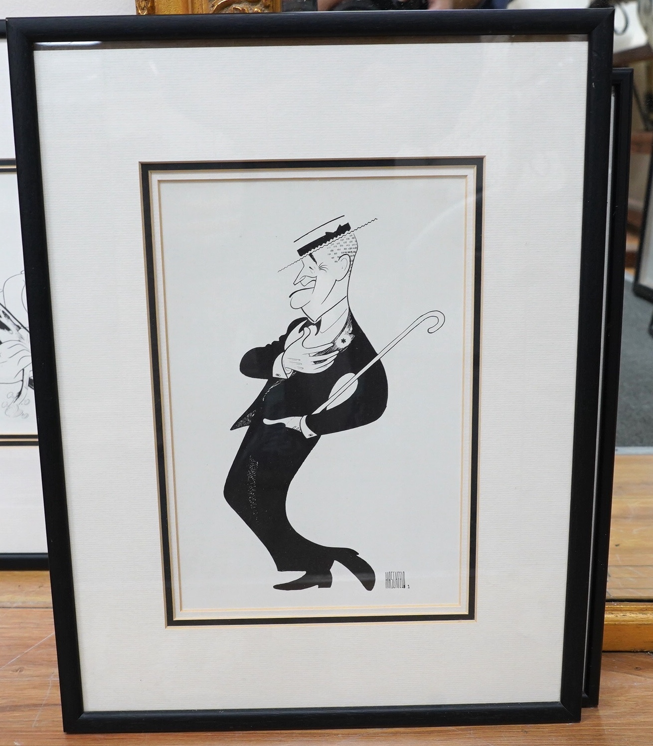 After Al Hirschfeld (1903-2003), four lithographs, including Bob Hope and Maurice Chevalier, each signed in plate, 25 x 15.5cm. Condition - good